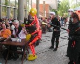 Typo Berlin: Petr van Blockland harassed by a puppet