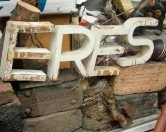 Retired sign letters in a new context